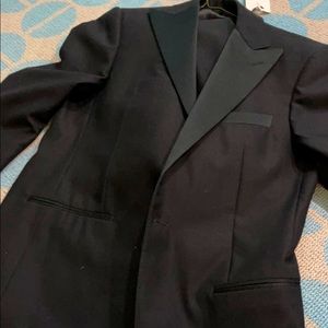 A tuxedo with full pants and jacket